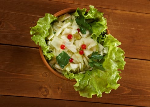 Spring  fresh 	farm-style vegetables salad of cabbage
