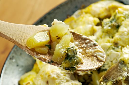 	farm-style 	country Codfish with potatoes and onions baked