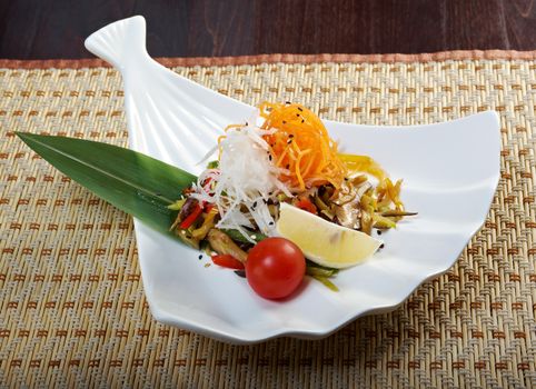 Salad from roasted eggplants, mushrooms, soy sauce.Japanese cuisine 