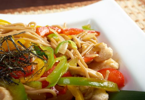 Japanese cuisine .noodles udon with chicken and vegetables