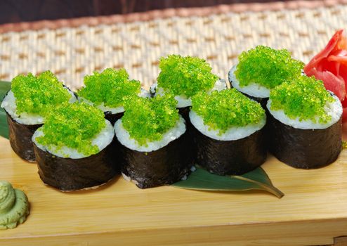 Tobiko (flying fish roe) Gunkan Maki Sushi.Roll made of Smoked fish