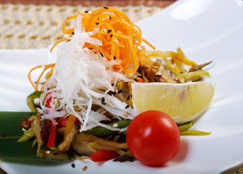 Salad from roasted eggplants, mushrooms, soy sauce.Japanese cuisine 