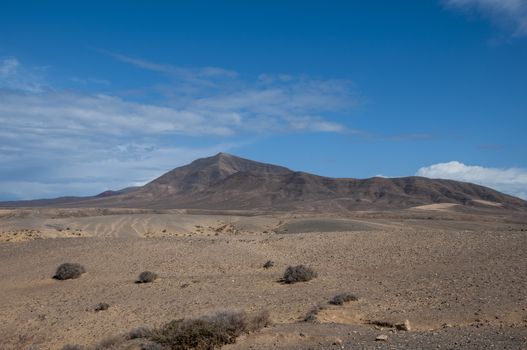 observed volcanic landscape where the desert with a volcano