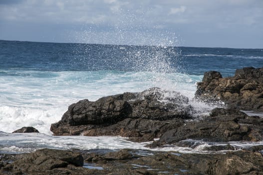 rocky beach where the waves observed