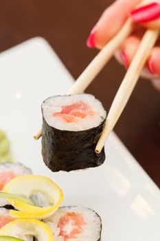 sushi with chopsticks