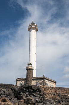 Lanzarote Harbor Lighthouse where the rocky landscape is observed