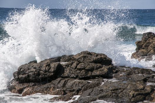 rocky beach where the waves observed