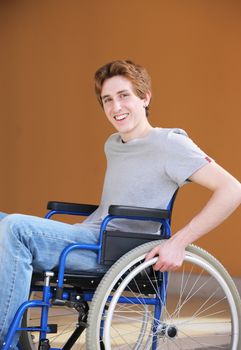 Portrait of a young man in a wheelchair