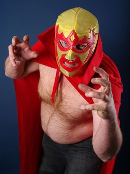 Photograph of a Mexican wrestler or Luchador posing.