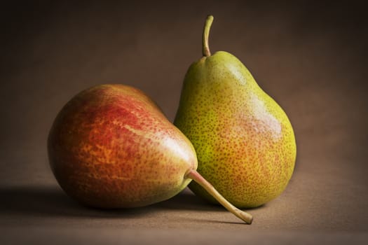 Picture of a still life with one apple and one pear