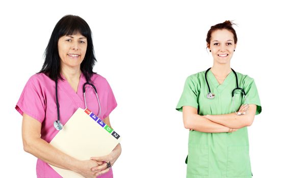 Friendly female doctors or nurses in pink and green scrubs isolated on white.