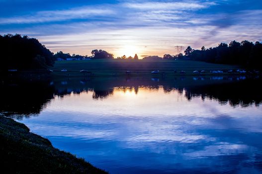 fishing lake at sunset landscape