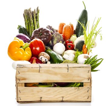 Assortment of fresh vegetables in a crate