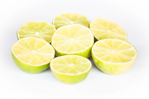 Half portion lime slice on white background