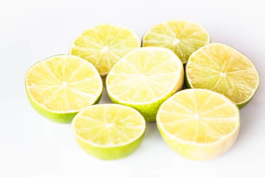 Fresh lime half portion slice on white background