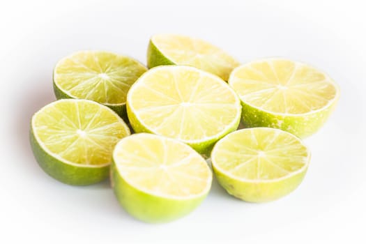 Fresh citrus lime half portion slice on white background