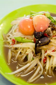 close up Thai spicy cuisine , spicy papaya salad with crab