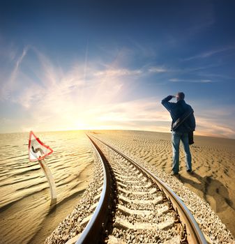 Man and the railway in the desert