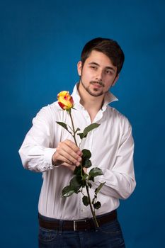 Man giving bouquet of red roses