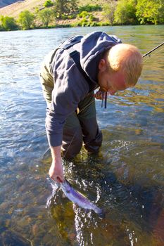 Catch and release fishing is a great sustainable way to enjoy angling yet leaving fish like this native rainbow trout redside for years to come.