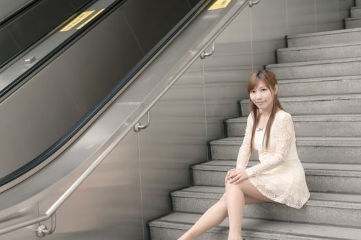 Asian beauty sit on stair, Taipei, Taiwan, Asia.