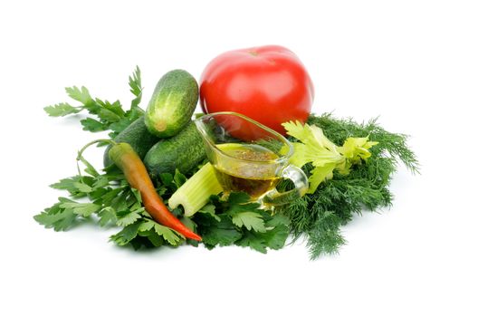 Arrangement of Ripe Tomato, Cucumbers, Chili Pepper, Parsley, Dill, Celery and Glass Gravy Boat with Olive Oil and Spices isolated on white background