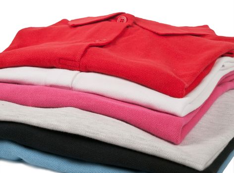 stack of man's and woman's polo t shirts