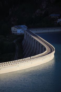 Dam in twilight at lake Fedaia