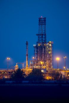 Oil refinery structures by night
