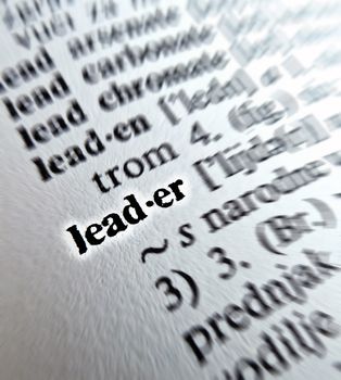 A close up of the word leader from a dictionary

