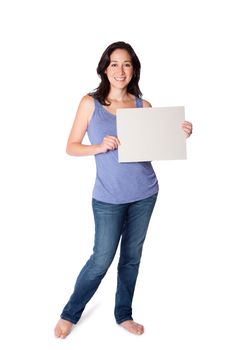 Happy smiling young woman standing holding whiteboard sign, isolated.