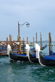 Gondolas on Grand Canal in Venice. Italy. Vertical view