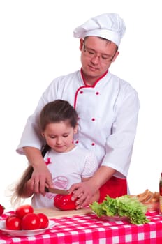 Father and daughter cooking a meal together