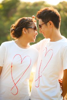 Happy Young Adult Couples in love outdoor