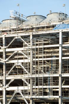 Assembling of liquefied natural gas Refinery Factory with LNG storage tank using for Oil and gas industry background