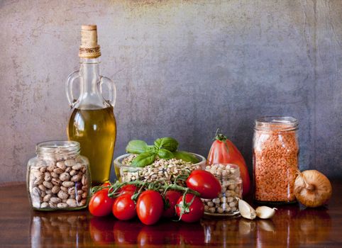 Great assortment of dry legumes: beans,emmer,red lentils,chickpeas with garlic,onion olive oil and tomatoes to spicy them up