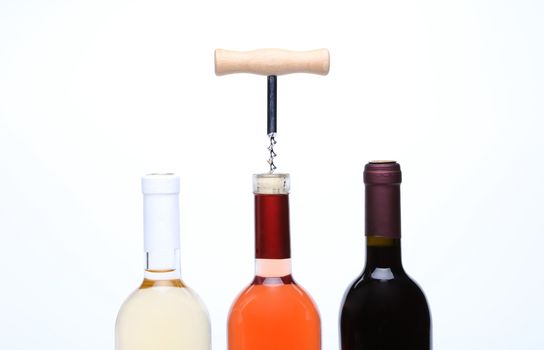 A set of three kinds of wine and corkscrew