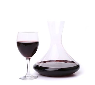 decanter with red wine and glass