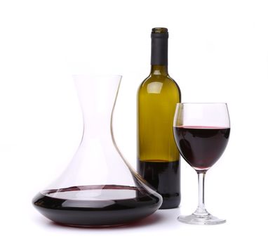 decanter, bottle and glass with red wine