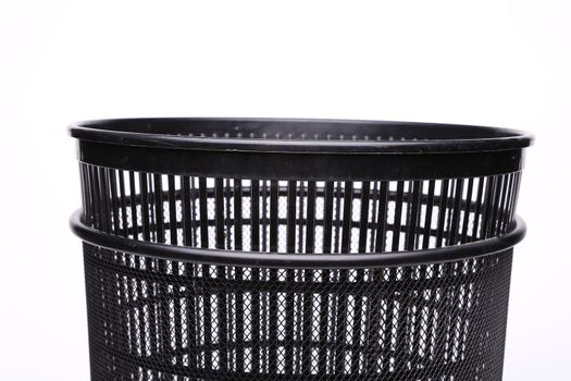 A top plastic trash can close-up