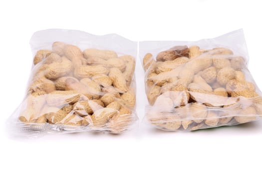 Two large plastic bags of peanuts