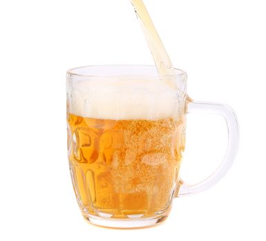 Beer pouring into beer mug