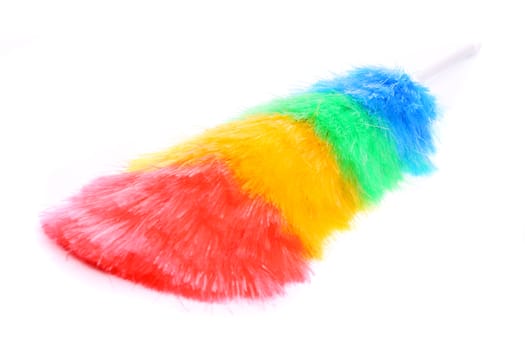Soft colorful duster with plastic handle close-up