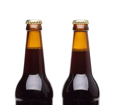 Two bottles of beer on white background.