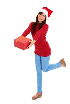 Giving Christmas gift. Young Asian Santa girl deliver a Christmas present. Full body isolated on white background.
