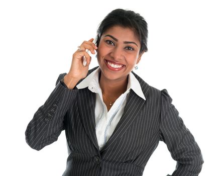 Indian woman talking on phone. Smart Indian business woman on the phone smiling happy isolated on white background. Beautiful Asian female model.
