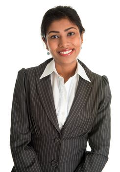 Indian businesswoman in business suit smiling looking at camera, standing isolated on white background. Asian female model.