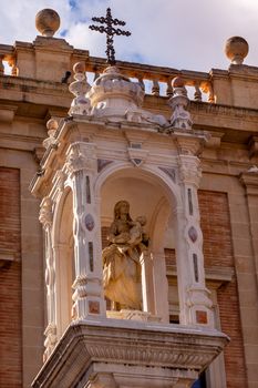 Mary Jesus Statue Cross Outside Seville Cathedral, Cathedral of Saint Mary of the See, Seville, Andalusia Spain.  Built in the 1500s. 