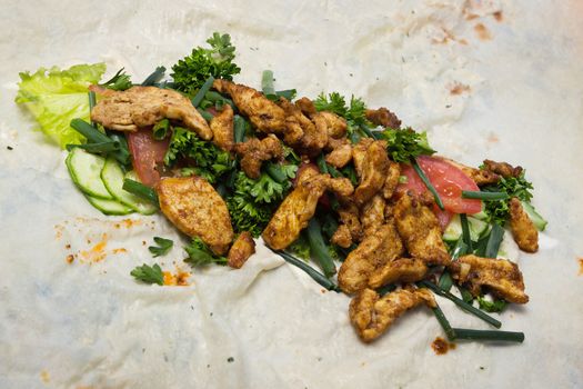 Ingredients for shawarma at home laid on dough