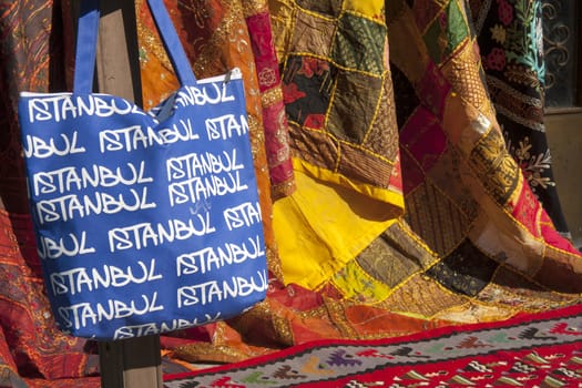 Turkish carpets and blue bag with Istanbul written all over it